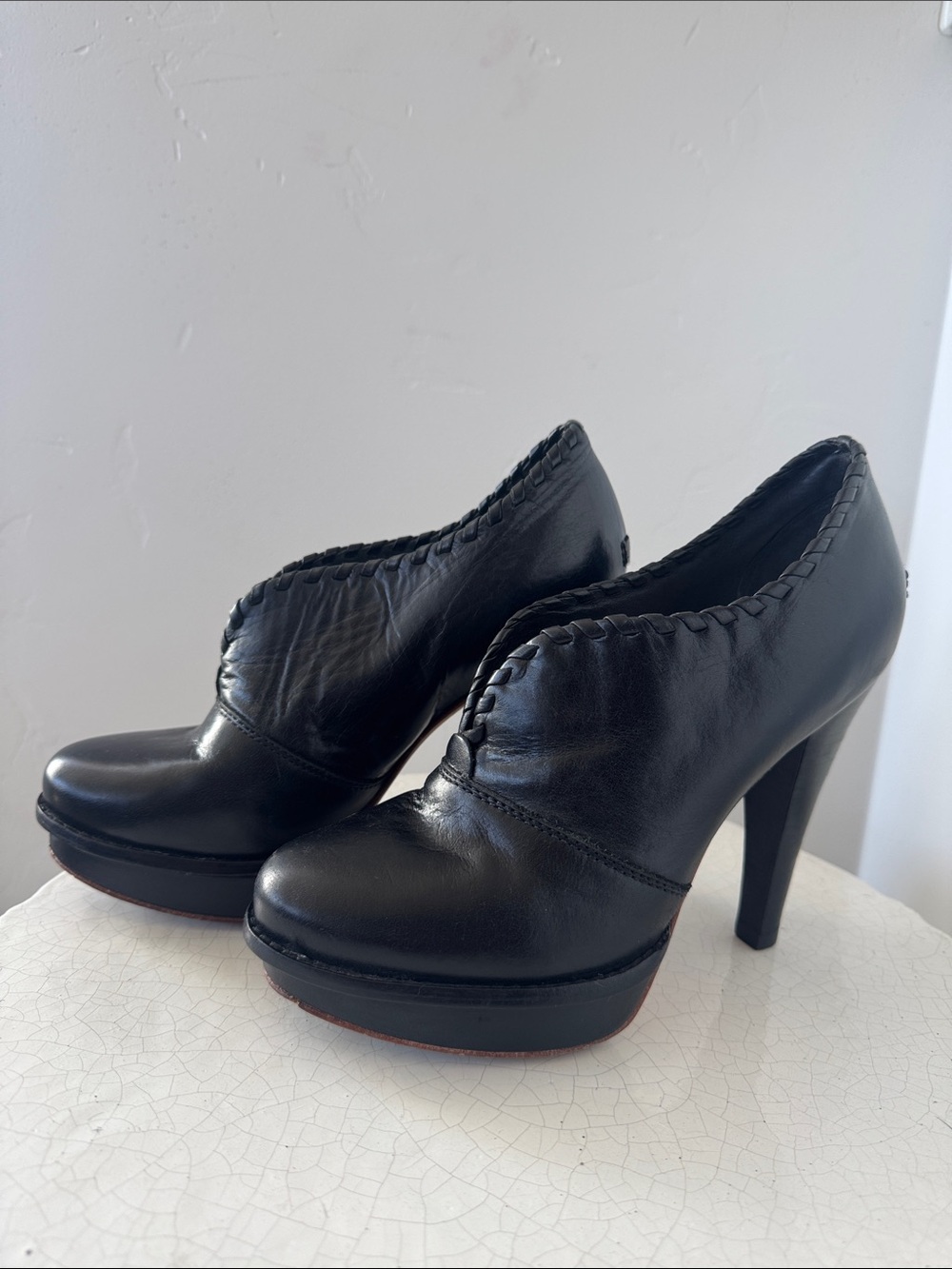 UGG Black Leather Platform High Heel Booties Slip-On Sleek Women’s Size 6.5 EUC